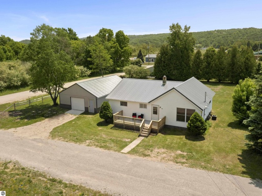 Welcome to the fully renovated 3-bedroom, 1 large bath ranch - Beach Home for sale in Elberta, Michigan on Beachhouse.com