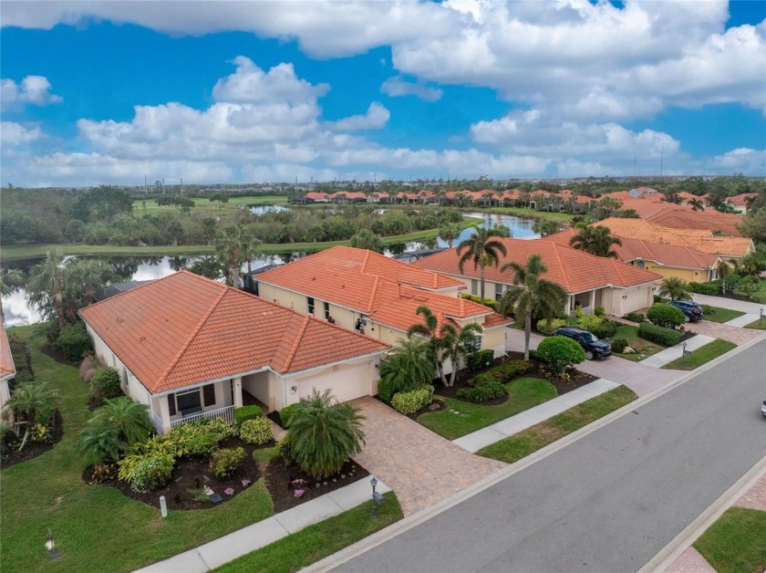 Discover Luxury Living in a Gated Golf Course Community! This - Beach Home for sale in Venice, Florida on Beachhouse.com