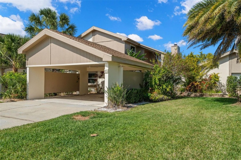 Welcome to your dream lakefront retreat in the picturesque town - Beach Townhome/Townhouse for sale in Oldsmar, Florida on Beachhouse.com