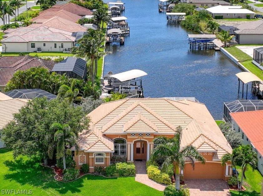 Stunning large 2700+ sq ft home with Down the Canal View and - Beach Home for sale in Cape Coral, Florida on Beachhouse.com