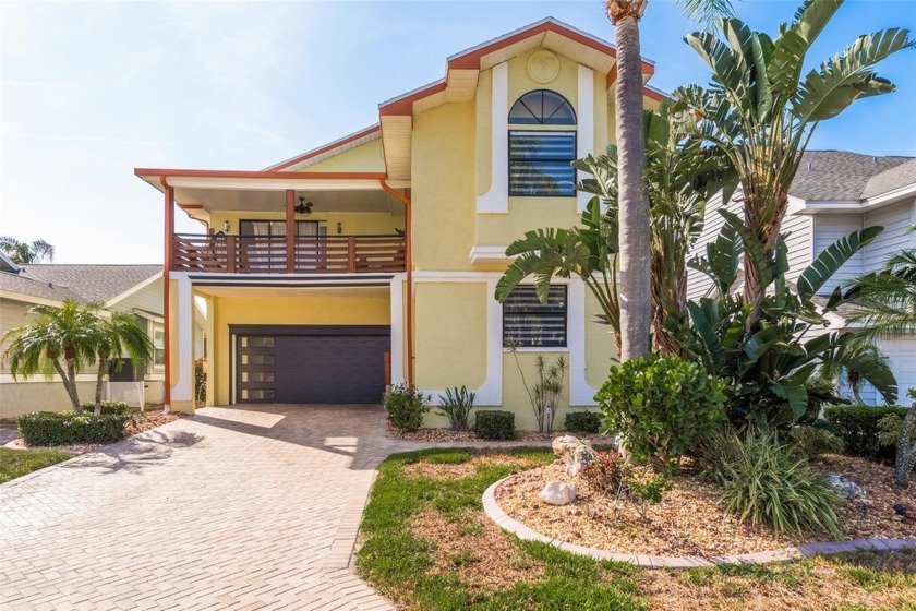 An Exquisite Waterfront Retreat Awaits! This stunning residence - Beach Home for sale in New Port Richey, Florida on Beachhouse.com