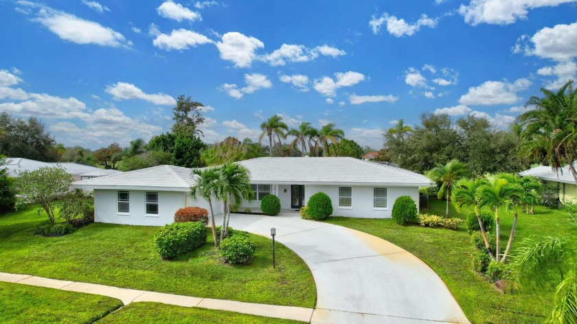 Panoramic golf and lake views abound at this Sandpiper Bay gem! - Beach Home for sale in Port Saint Lucie, Florida on Beachhouse.com