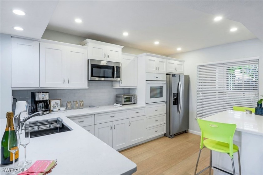 Welcome to this beautifully RENOVATED, LAKE-FRONT, first-floor - Beach Condo for sale in Naples, Florida on Beachhouse.com