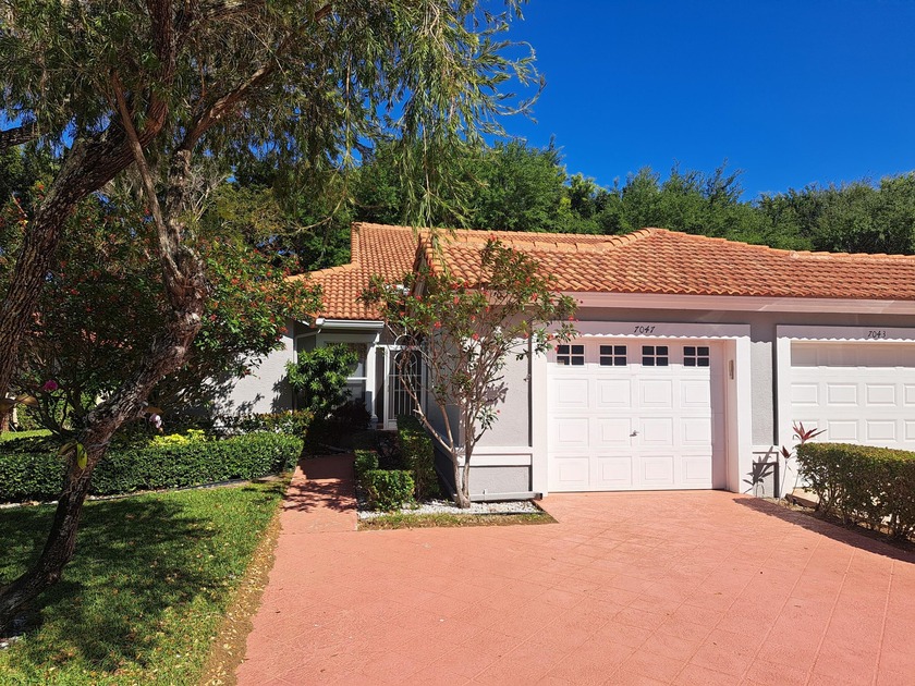 In the heart of Palm Isles--just steps from world-class - Beach Condo for sale in Boynton Beach, Florida on Beachhouse.com