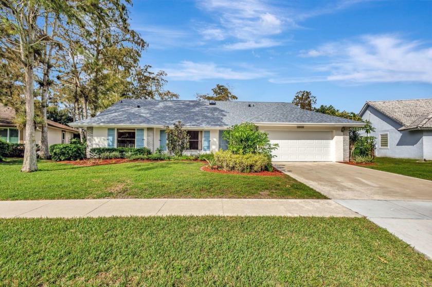 No HOA, New Roof (10/2024).  This freshly painted home in the - Beach Home for sale in Wellington, Florida on Beachhouse.com