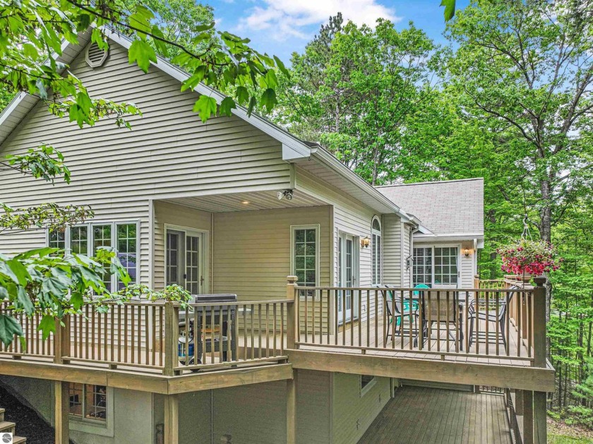 In a serene wooded setting on the outskirts of Traverse City - Beach Home for sale in Traverse City, Michigan on Beachhouse.com