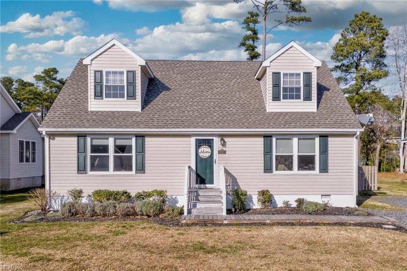 Step into this beautifully renovated four-bedroom, two-bath - Beach Home for sale in Greenbackville, Virginia on Beachhouse.com