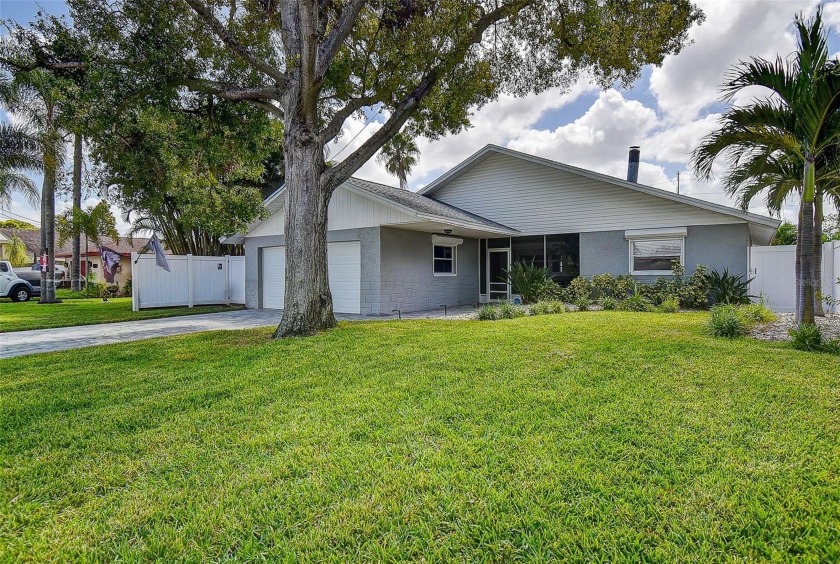 Welcome to this beautifully updated 3-bedroom, 2.5-bath solid - Beach Home for sale in Seminole, Florida on Beachhouse.com
