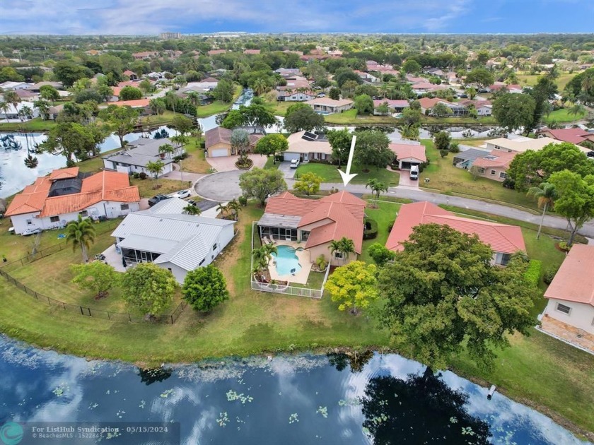Well maintained 4 bedroom pool home with panoramic water view! - Beach Home for sale in Coral Springs, Florida on Beachhouse.com