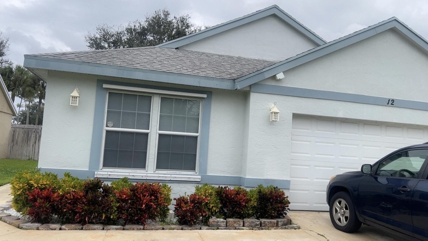 Fall in love with this stunning 3-bedroom, 2-bath home in - Beach Home for sale in Boynton Beach, Florida on Beachhouse.com