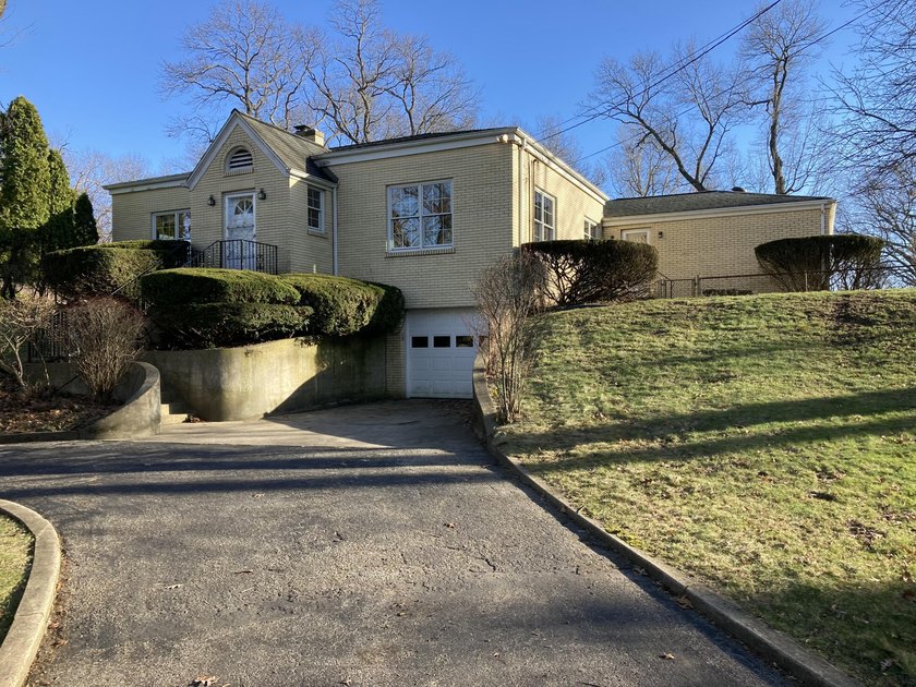 Quaint brick ranch on a tree-lined street just two blocks from - Beach Home for sale in Long Beach, Indiana on Beachhouse.com