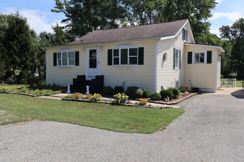 Immaculately Maintained Cottage within the commercial US 12 - Beach Home for sale in New Buffalo, Michigan on Beachhouse.com
