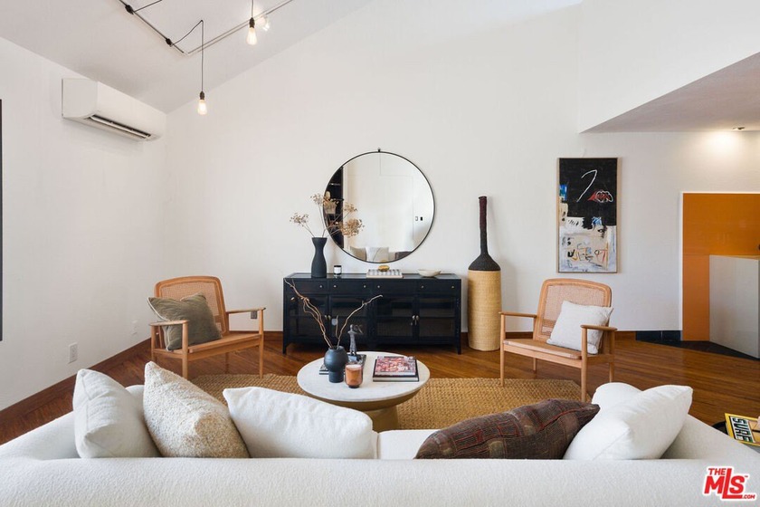 Soaring ceilings, bright southern exposure, and a location that - Beach Condo for sale in Santa Monica, California on Beachhouse.com