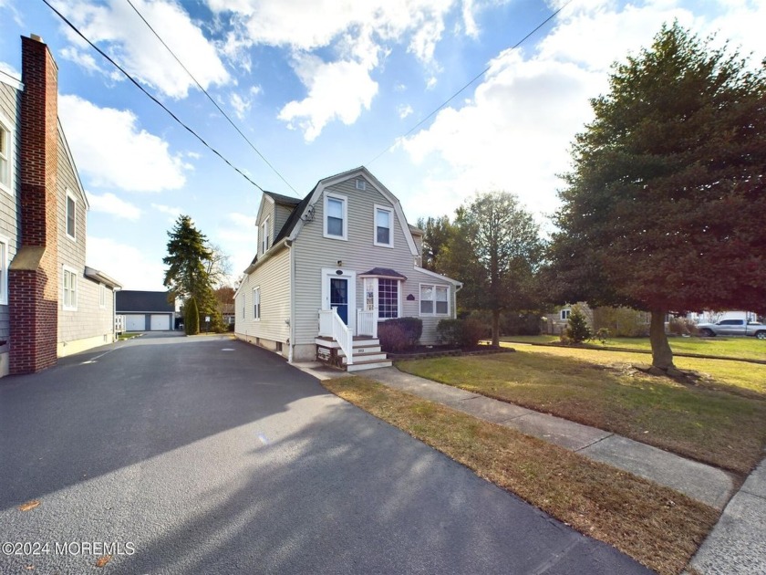 Nestled in the heart of Manasquan, this AMAZING 2-home property - Beach Home for sale in Manasquan, New Jersey on Beachhouse.com