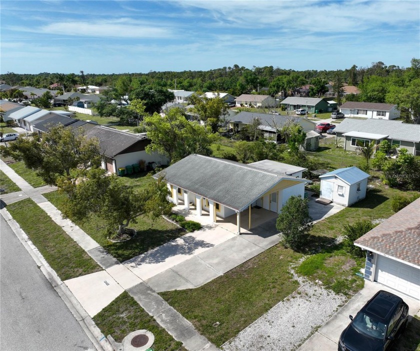 Welcome to 13468 Romford Ave nestled in the serene enclave of - Beach Home for sale in Port Charlotte, Florida on Beachhouse.com