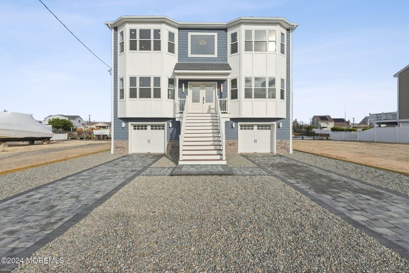 DREAM NEW CONSTRUCTION WATERFRONT home in Manahawkin! Boasting - Beach Home for sale in Manahawkin, New Jersey on Beachhouse.com