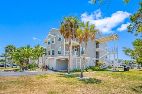 Stunning waterfront home in the community of Mariners Way. This - Beach Condo for sale in New Port Richey, Florida on Beachhouse.com