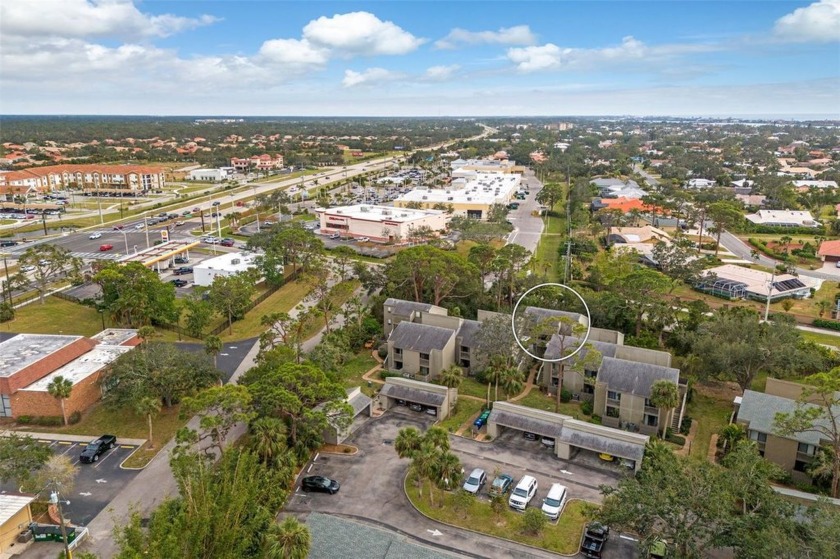 Step into the serene lifestyle at 129 Woodland Place, a charming - Beach Condo for sale in Osprey, Florida on Beachhouse.com