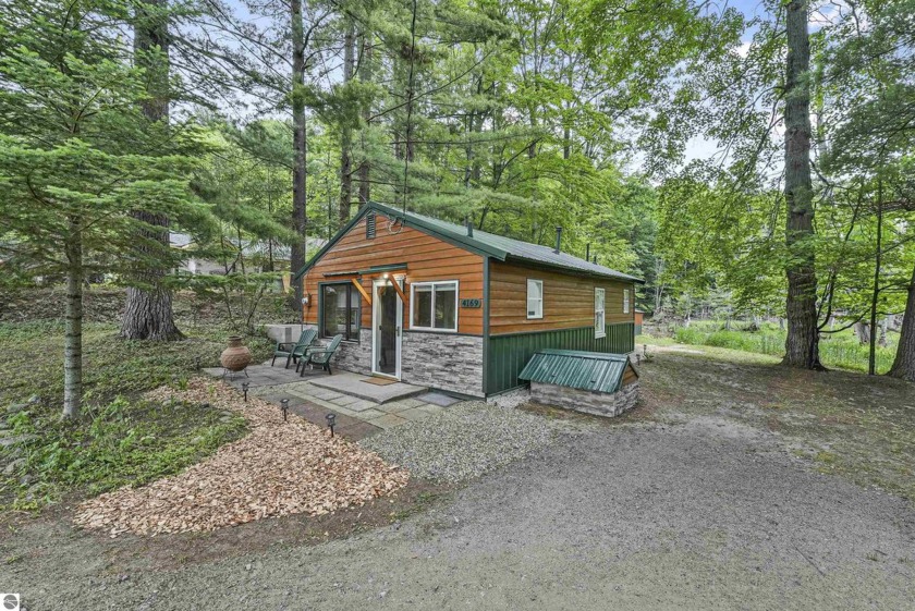 Discover this quaint and charming home on Traverse City's east - Beach Home for sale in Traverse City, Michigan on Beachhouse.com