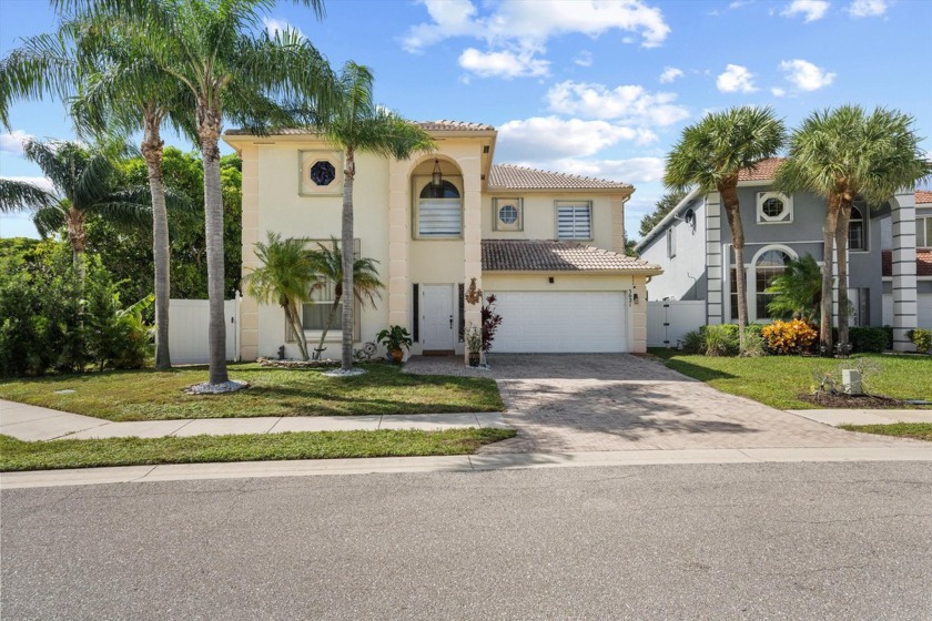 Exquisite 5-bed/4-bath residence nestled in a gated community - Beach Home for sale in West Palm Beach, Florida on Beachhouse.com