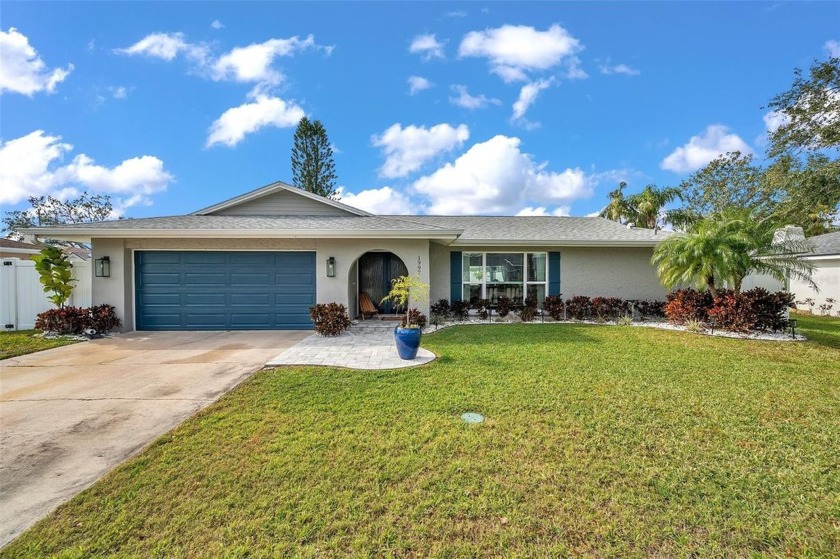 Nestled in the highly sought-after Arvis Circle community, this - Beach Home for sale in Clearwater, Florida on Beachhouse.com