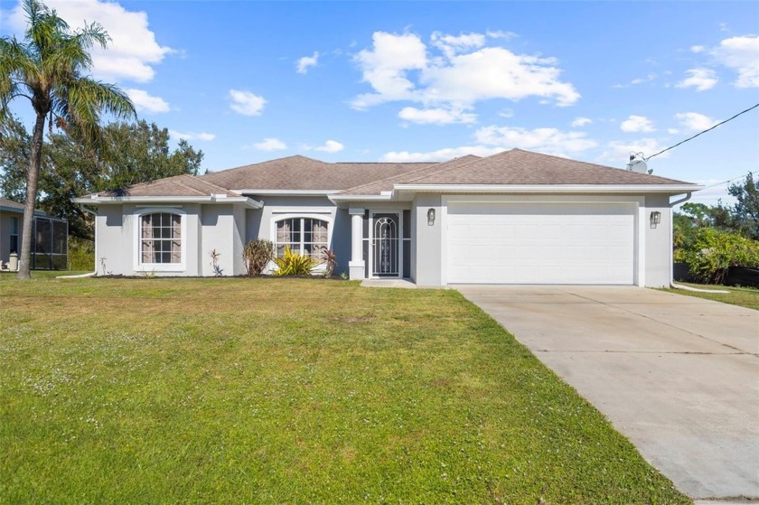 Welcome to this stunning 3-bedroom, 2-bath home with a versatile - Beach Home for sale in North Port, Florida on Beachhouse.com