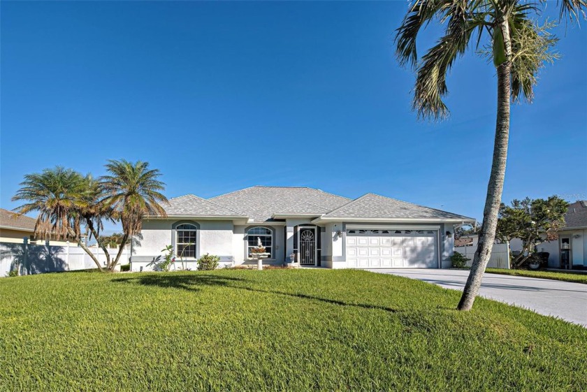 Exceptional curb appeal awaits you in this well maintained and - Beach Home for sale in Venice, Florida on Beachhouse.com