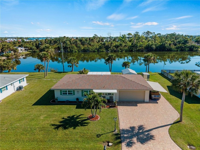 Nestled on a tranquil street in Englewood, this furnished - Beach Home for sale in Englewood, Florida on Beachhouse.com