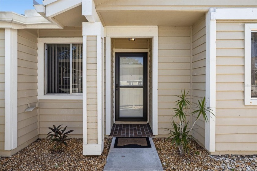 Welcome to this charming end-unit villa in a private 2-unit - Beach Home for sale in Venice, Florida on Beachhouse.com