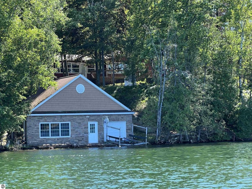 Enjoy the 153 ft of sandy bottom on 453 acres of beautiful tree - Beach Home for sale in Traverse City, Michigan on Beachhouse.com