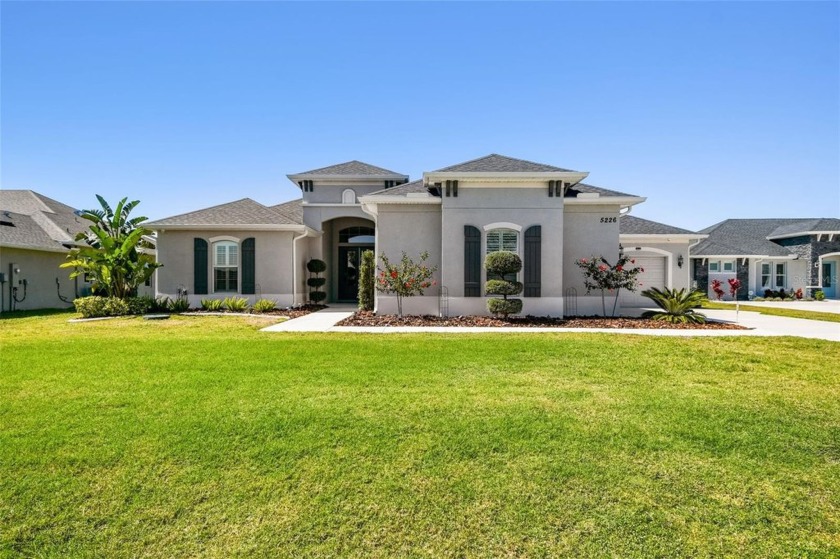 Nestled within the serene and wildlife-rich Lake Toscana - Beach Home for sale in Wimauma, Florida on Beachhouse.com