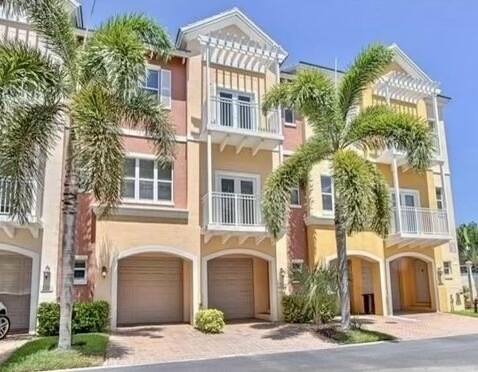 Experience coastal living in this stunning 3-level end-unit - Beach Townhome/Townhouse for sale in Lighthouse Point, Florida on Beachhouse.com