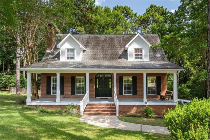 This charming creole cottage rests on just under one acre lot - Beach Home for sale in Fairhope, Alabama on Beachhouse.com