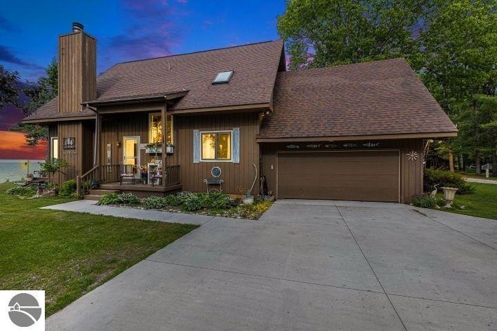 This charming beachfront home overlooks the Straits of Mackinac - Beach Home for sale in Cheboygan, Michigan on Beachhouse.com