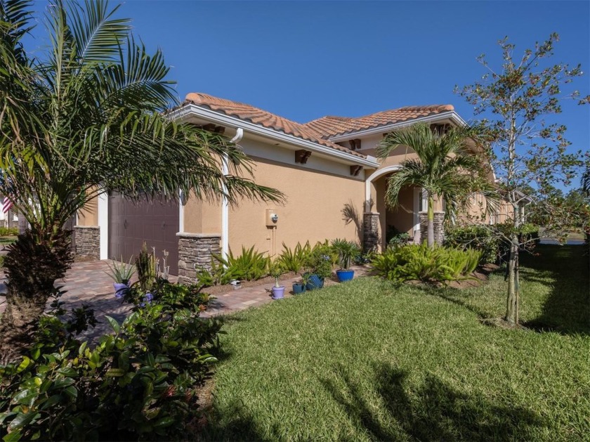 Savor the serene, maintenance-free living in this gorgeously - Beach Home for sale in Venice, Florida on Beachhouse.com