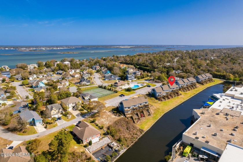 Step into a world of unparalleled luxury at 8711 Plantation - Beach Townhome/Townhouse for sale in Emerald Isle, North Carolina on Beachhouse.com