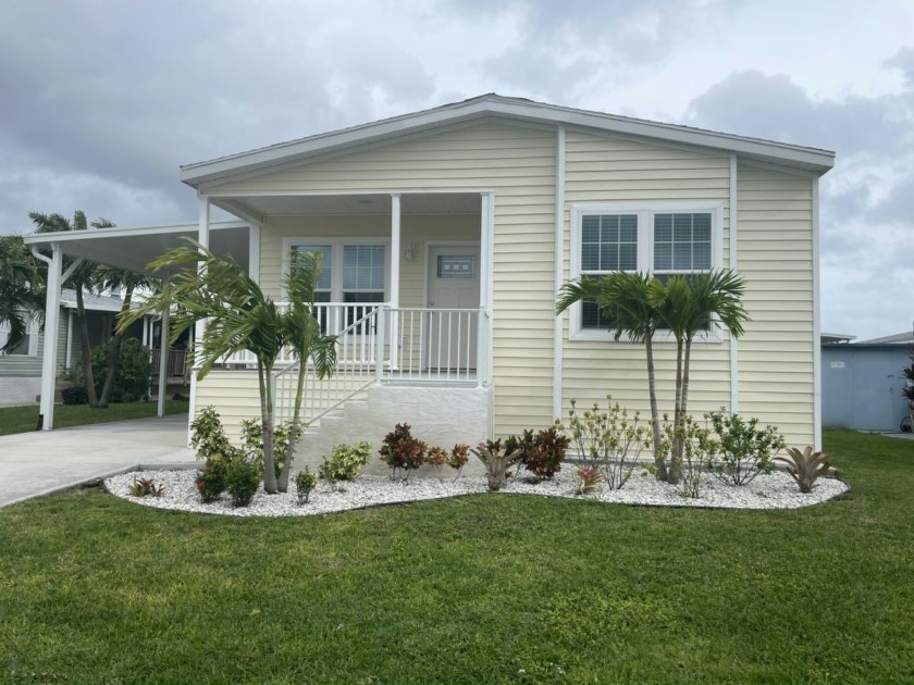 Own your own home in a quiet, well-maintained neighborhood! This - Beach Home for sale in Riviera Beach, Florida on Beachhouse.com