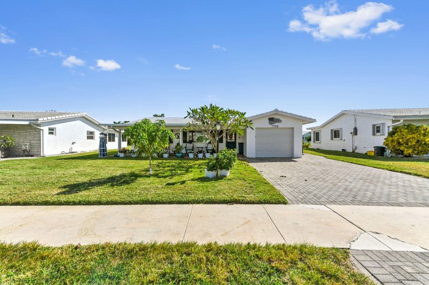 Welcome to this beautifully updated 3-bedroom, 2-bathroom home - Beach Home for sale in Boynton Beach, Florida on Beachhouse.com