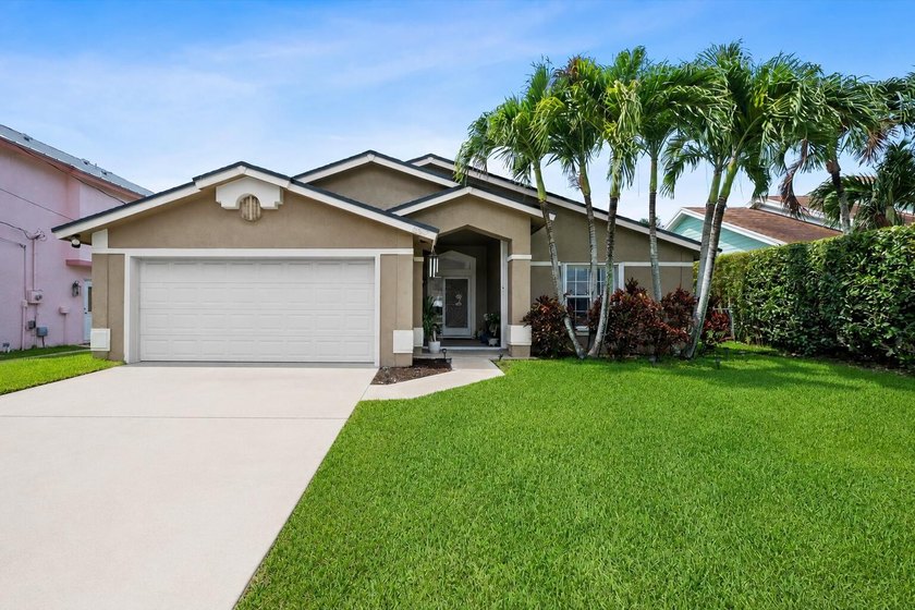 Welcome to this beautifully maintained 3-bedroom, 2-bath home - Beach Home for sale in Jupiter, Florida on Beachhouse.com