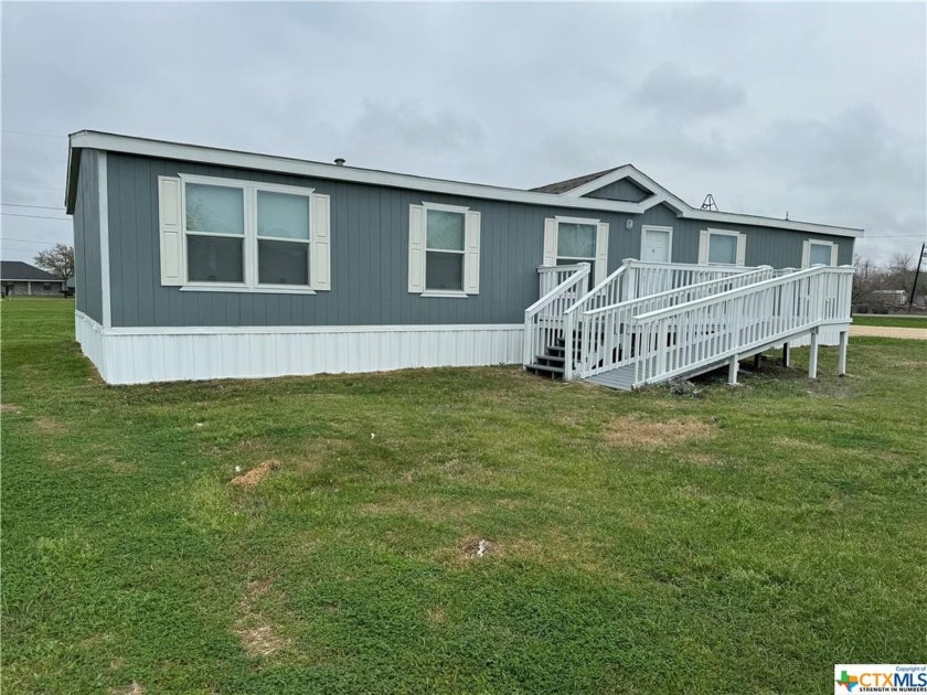 Welcome to this charming four-bedroom, three-bathroom home - Beach Home for sale in Seadrift, Texas on Beachhouse.com