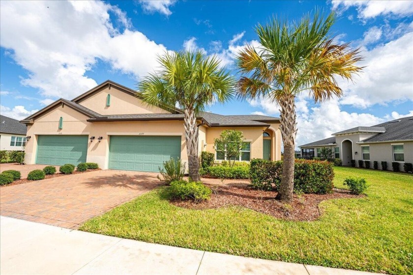 This charming waterfront villa, nestled in a peaceful cul-de-sac - Beach Home for sale in Port Saint Lucie, Florida on Beachhouse.com