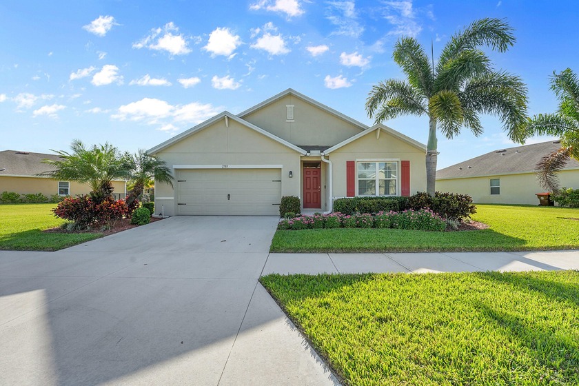 Discover modern comfort and serene lake views in this stunning 4 - Beach Home for sale in Vero Beach, Florida on Beachhouse.com