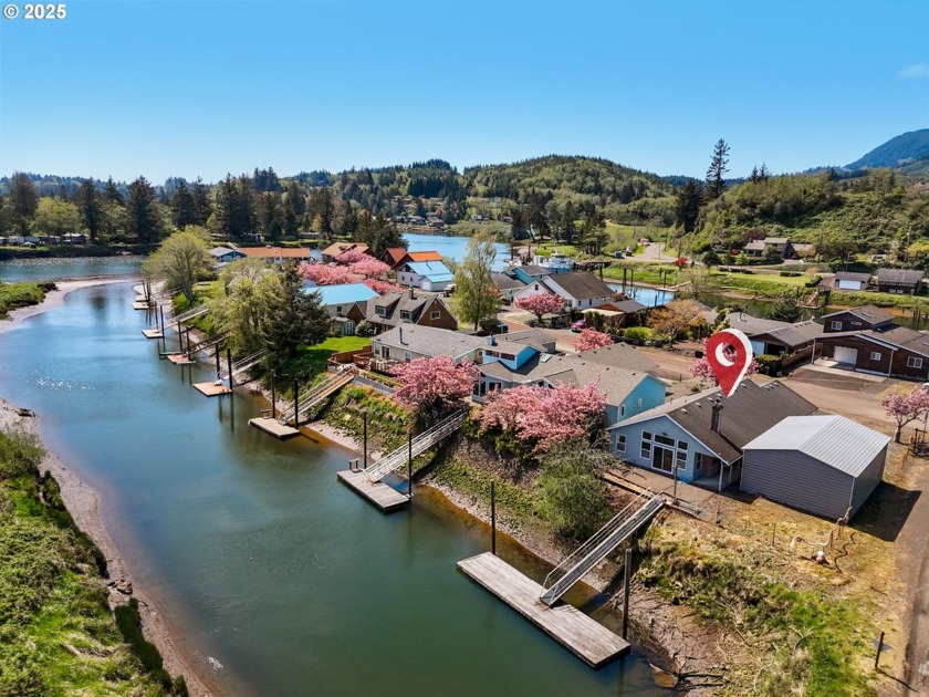 Wouldn't you love to live on Island Drive? Picture yourself - Beach Home for sale in Nehalem, Oregon on Beachhouse.com