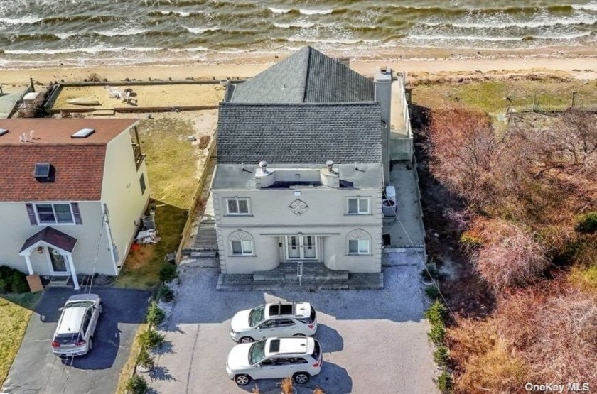 Location, location, location !  This unique waterfront home - Beach Home for sale in Shirley, New York on Beachhouse.com