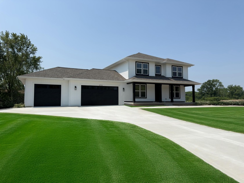 LOYL Construction presents a wonderful opportunity to own a new - Beach Home for sale in Manistee, Michigan on Beachhouse.com