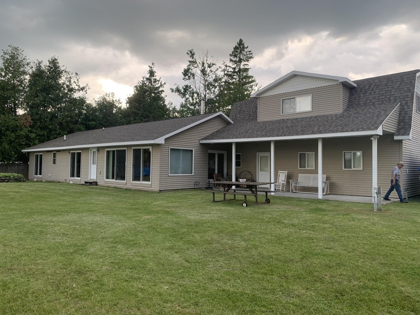 Peaceful Waterfront Retreat on Grand Lake Enjoy wonderful - Beach Home for sale in Presque Isle, Michigan on Beachhouse.com