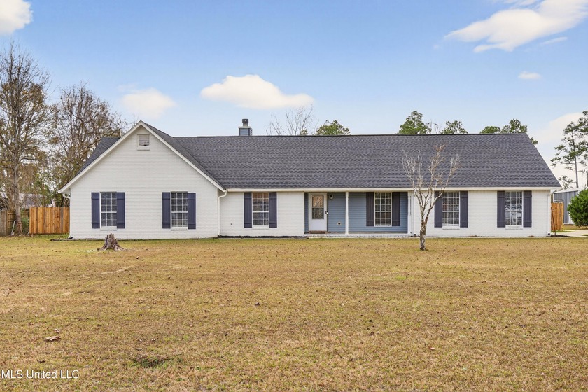 Meticulously maintained and thoughtfully updated four-bedroom - Beach Home for sale in Biloxi, Mississippi on Beachhouse.com