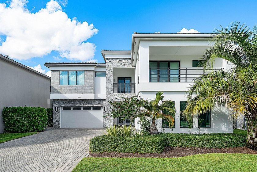 This stunning, lakefront, Maldives model with a Salt Water Pool - Beach Home for sale in Boca Raton, Florida on Beachhouse.com