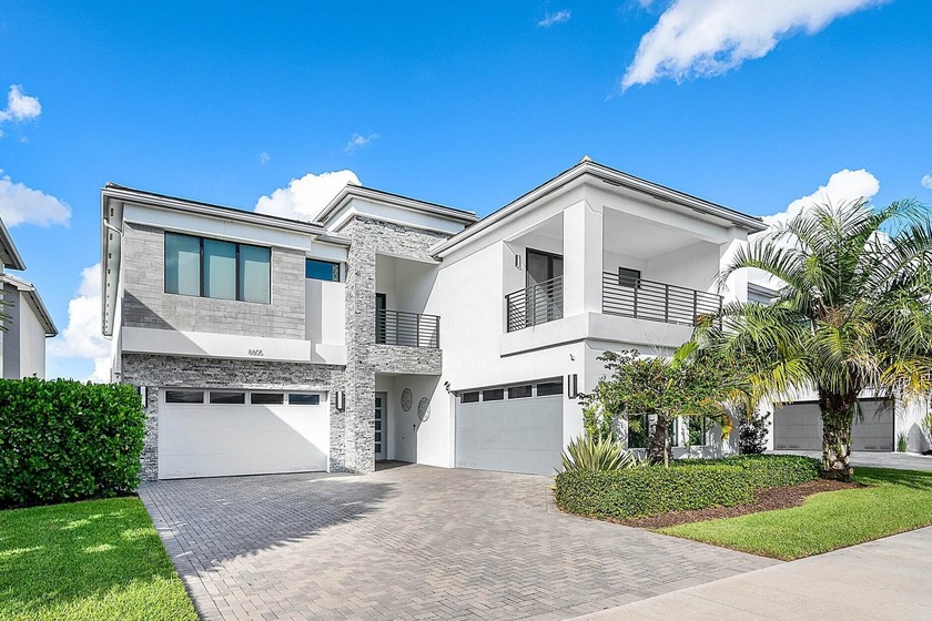 This stunning, lakefront, Maldives model with a Salt Water Pool - Beach Home for sale in Boca Raton, Florida on Beachhouse.com