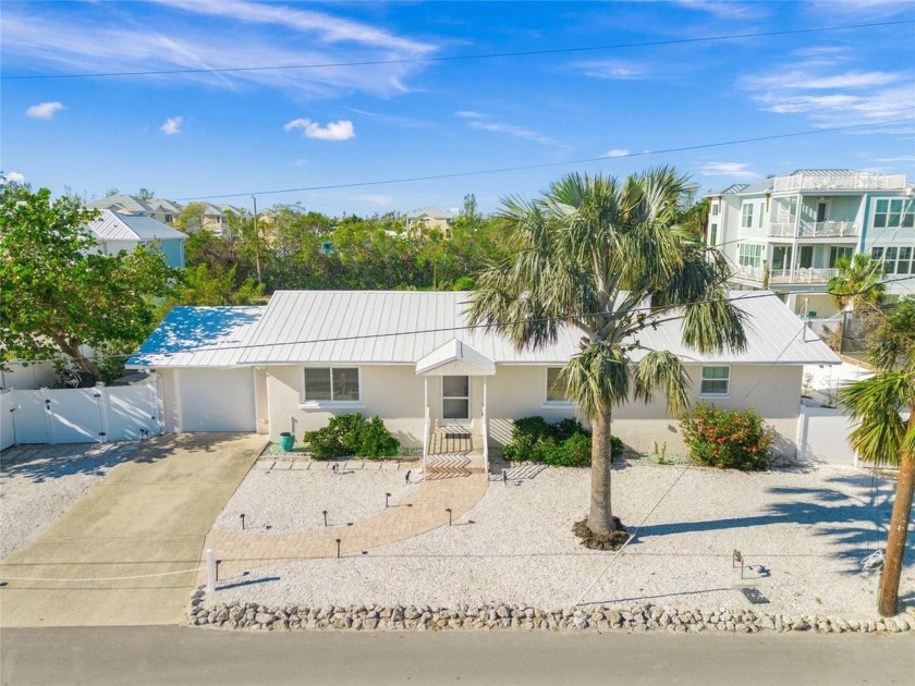 Come open the door to your new home! Beautiful single-family - Beach Home for sale in Longboat Key, Florida on Beachhouse.com